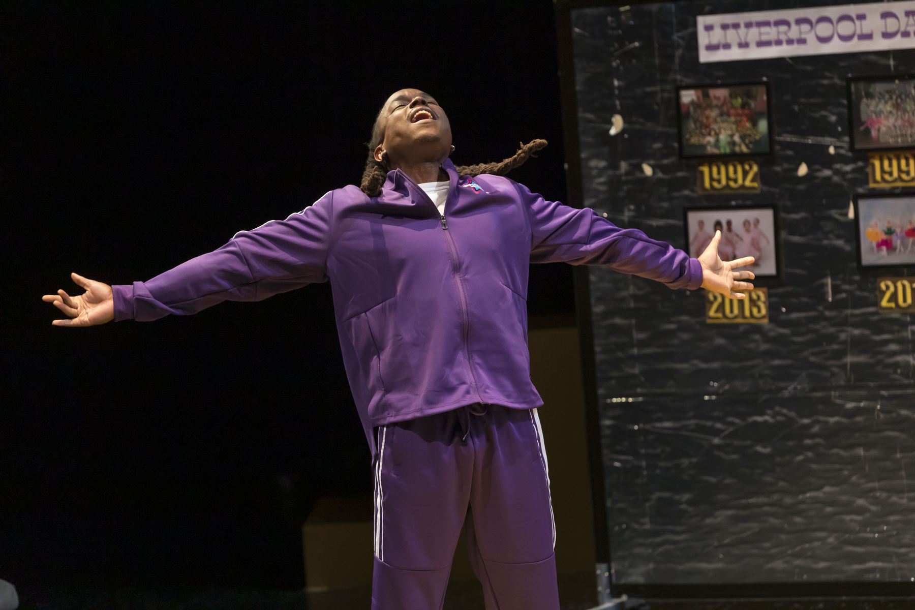 Brian Alexander Davis as Dance Teacher Pat, arms outstretched, Dance Nation