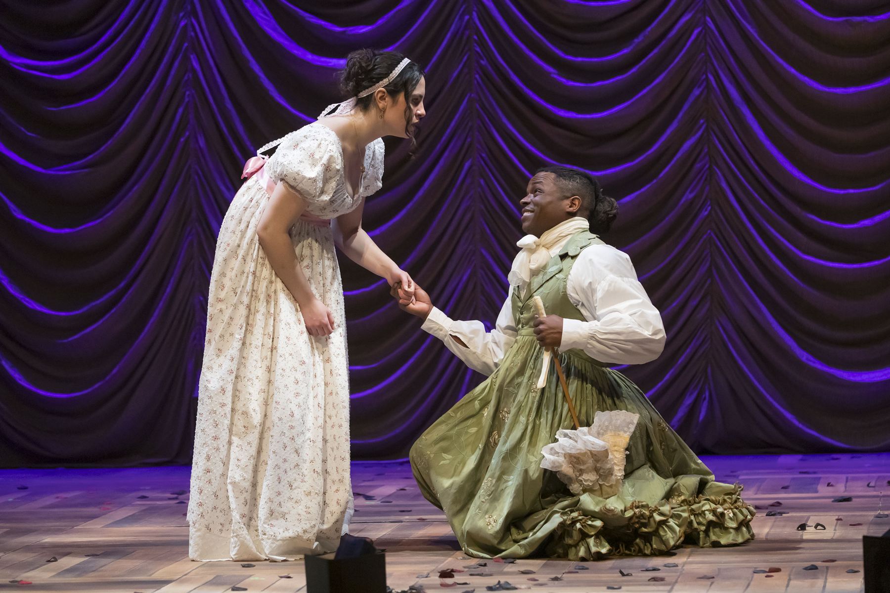 A tender hand-kiss on bended knee
